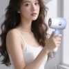 Designed with an 800W motor and a compact foldable handle, this lightweight hair dryer is ideal for everyday styling at home or while traveling. Choose from three heat and airflow settings to suit your hair type and styling needs, while built-in overheating protection provides added peace of mind.