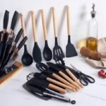Premium 19-piece silicone kitchen utensil set with stainless steel knives, cutting board, and storage holder