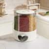Rotating multi-compartment grain storage dispenser with airtight lid and one-touch dispensing system